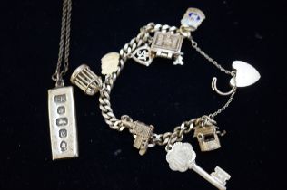 Silver charm bracelet & silver ingot & chain