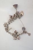 Silver charm bracelet - 12 charms