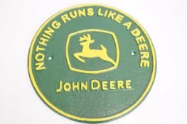 Cast iron John deere sign