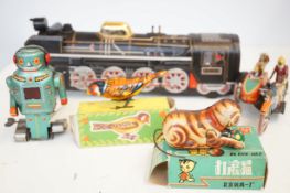 Collection of tin plate toys, some early & origina