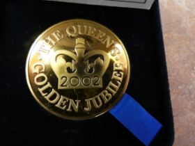 The Queens golden jubilee commemorative silver med