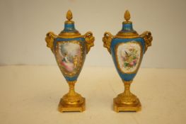 Pair of continental hand painted 19th century gilt bronze vases, coverts into candle sticks Height