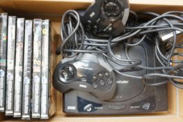 Sega saturn with games & controllers