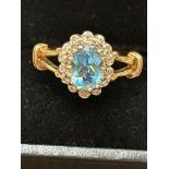 9ct Gold ring set with blue topaz & diamonds Size