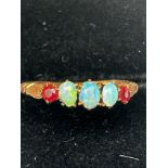 9ct Gold ring set wth 3 opals & 2 garnets Size O 1