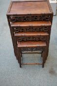 Oriental carved nest of 4 tables