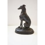 Metal greyhound sitting signed