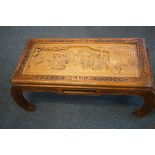 Oriental carved coffee table