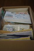 Large collection of postcards, stamps & first day