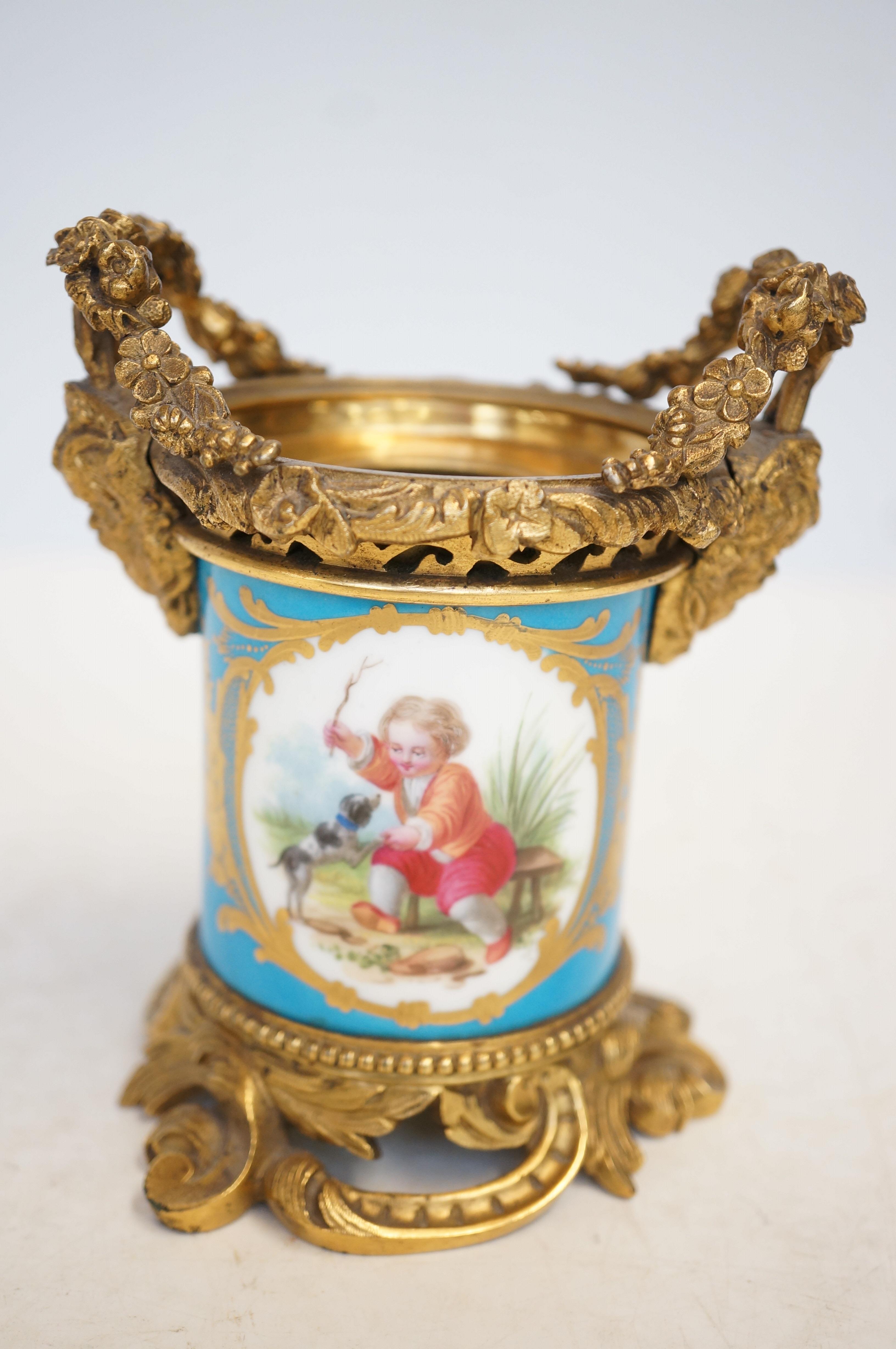 Sevres hand painted & gilt bronze pot (no cover) hair line to blue on side & blemish Height 13 cm