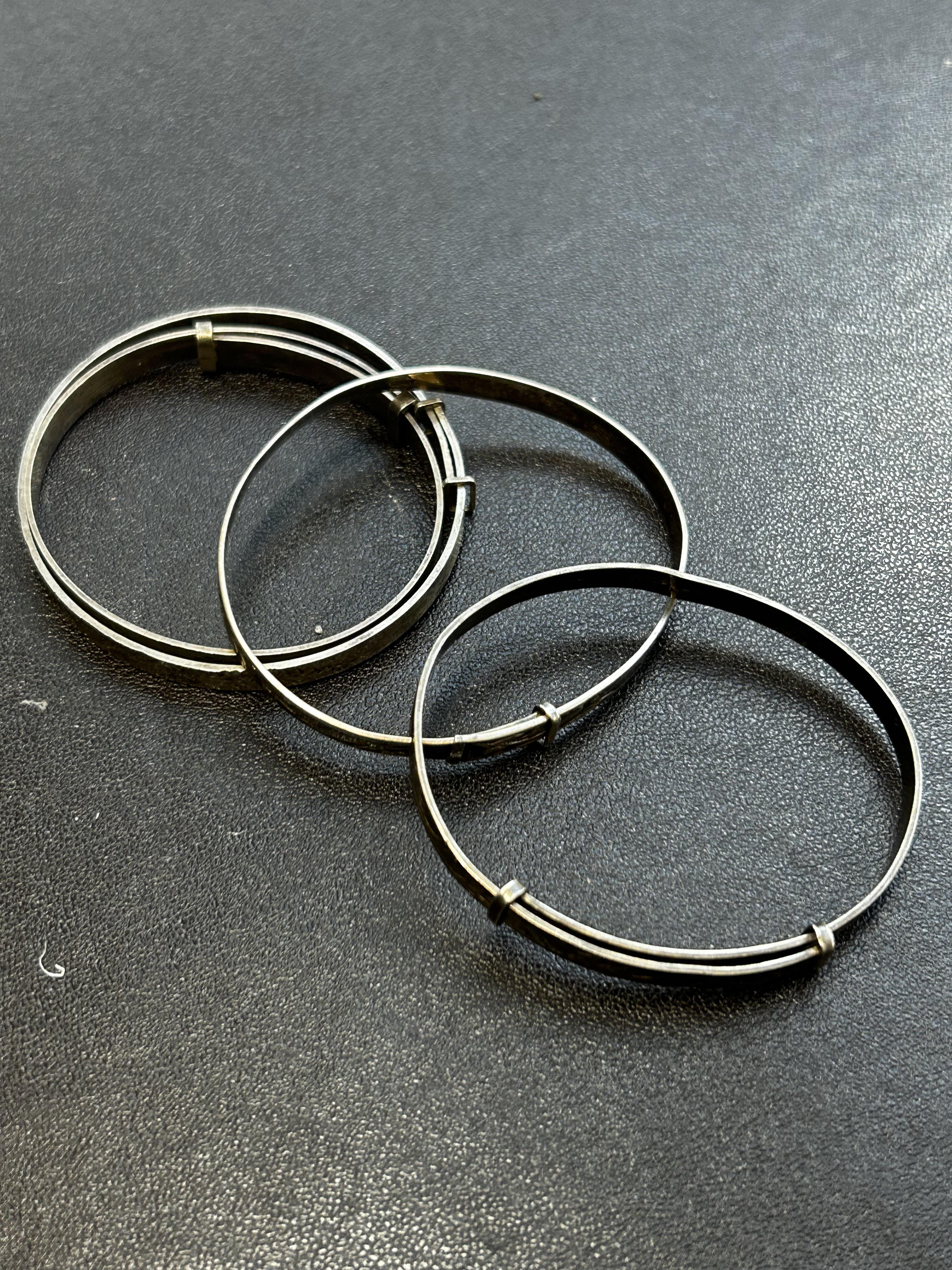 4 Silver bangles