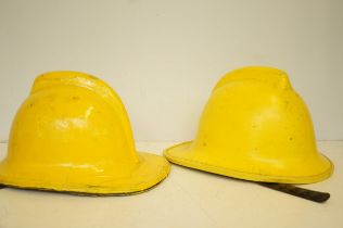 2 Firemans helmets with leather liners