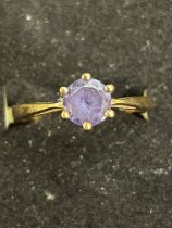 9ct Gold ring set with solitaire blue stone Weight