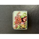 Silver pill box with enamel fairy design