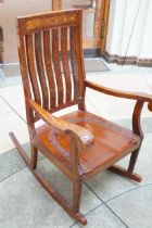 Good quality rocking chair with brass inlay
