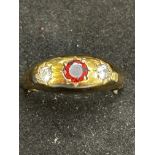9ct Gold ring set wth 2 white stones & central gar