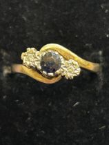 9ct Gold ring set with sapphire & 2 diamonds Size