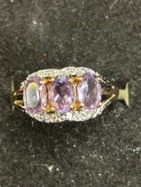 10ct Gold ring set with 3 amethyst 1.2g Size N