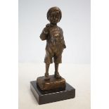 Bronze boy with cigar on marble base signed