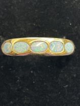 9ct Gold ring set with 5 opals Size W 2.3g
