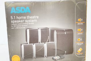 Home theatre speaker system appears to be unused