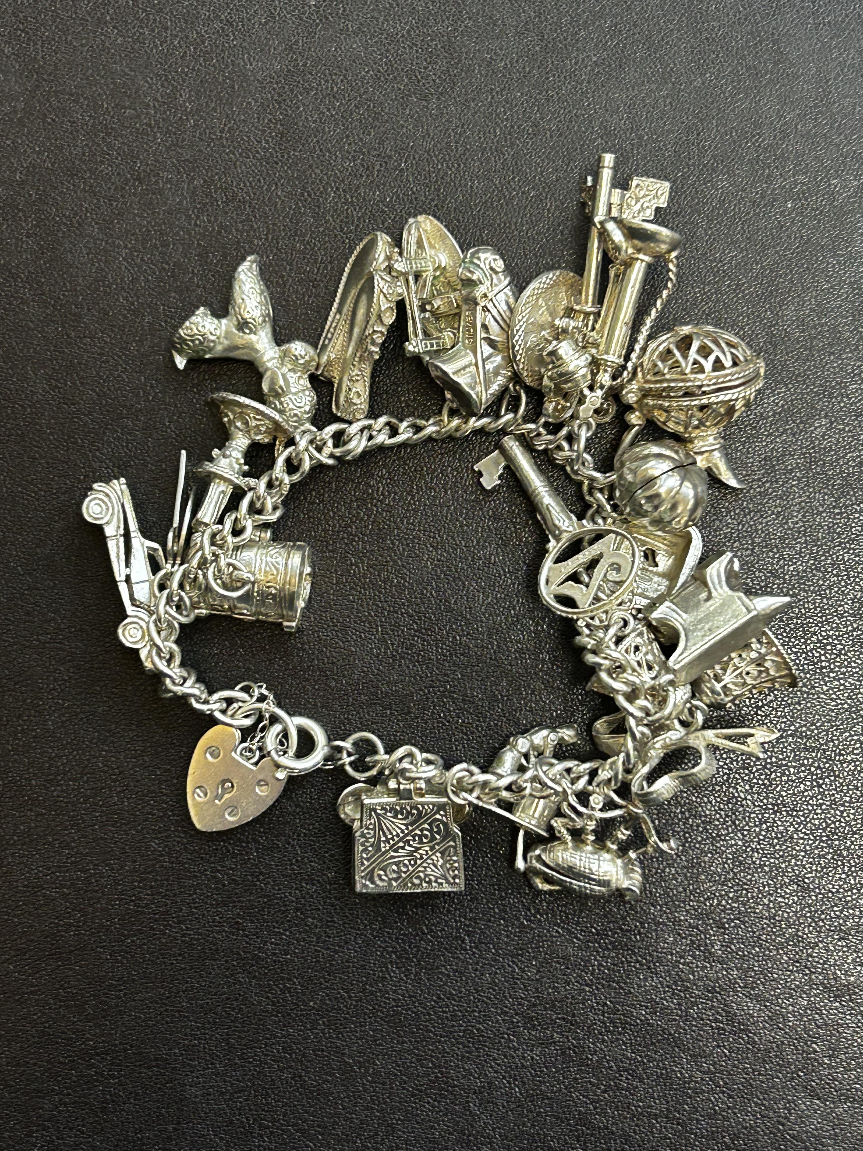 Silver charm bracelet 91g - 20 charms