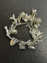 Silver charm bracelet 91g - 20 charms