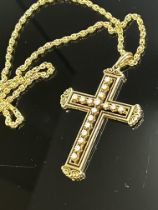 Liberace chain & cross pendant. 14 carat yellow go