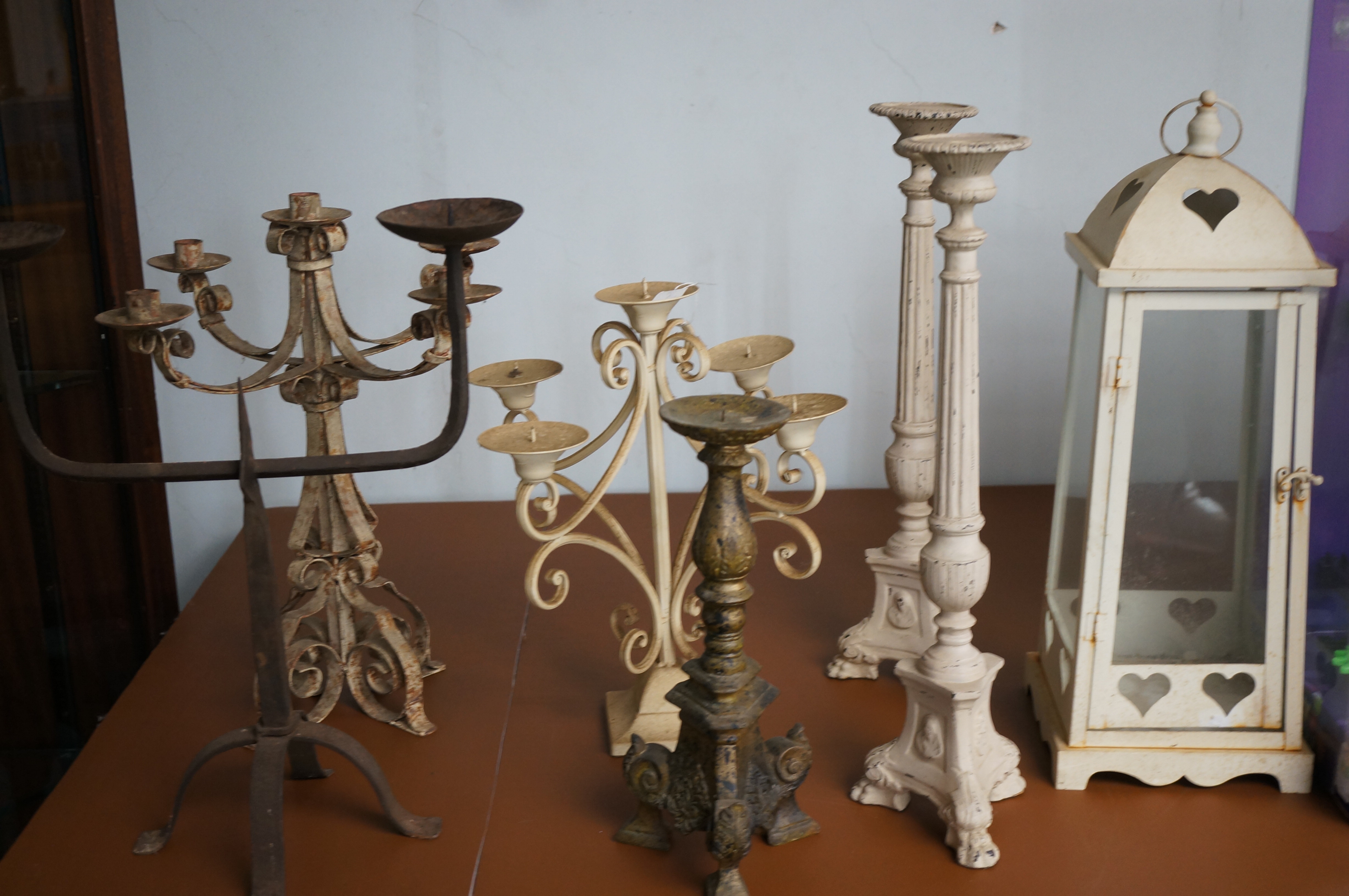 Collection of metal & wood candle sticks