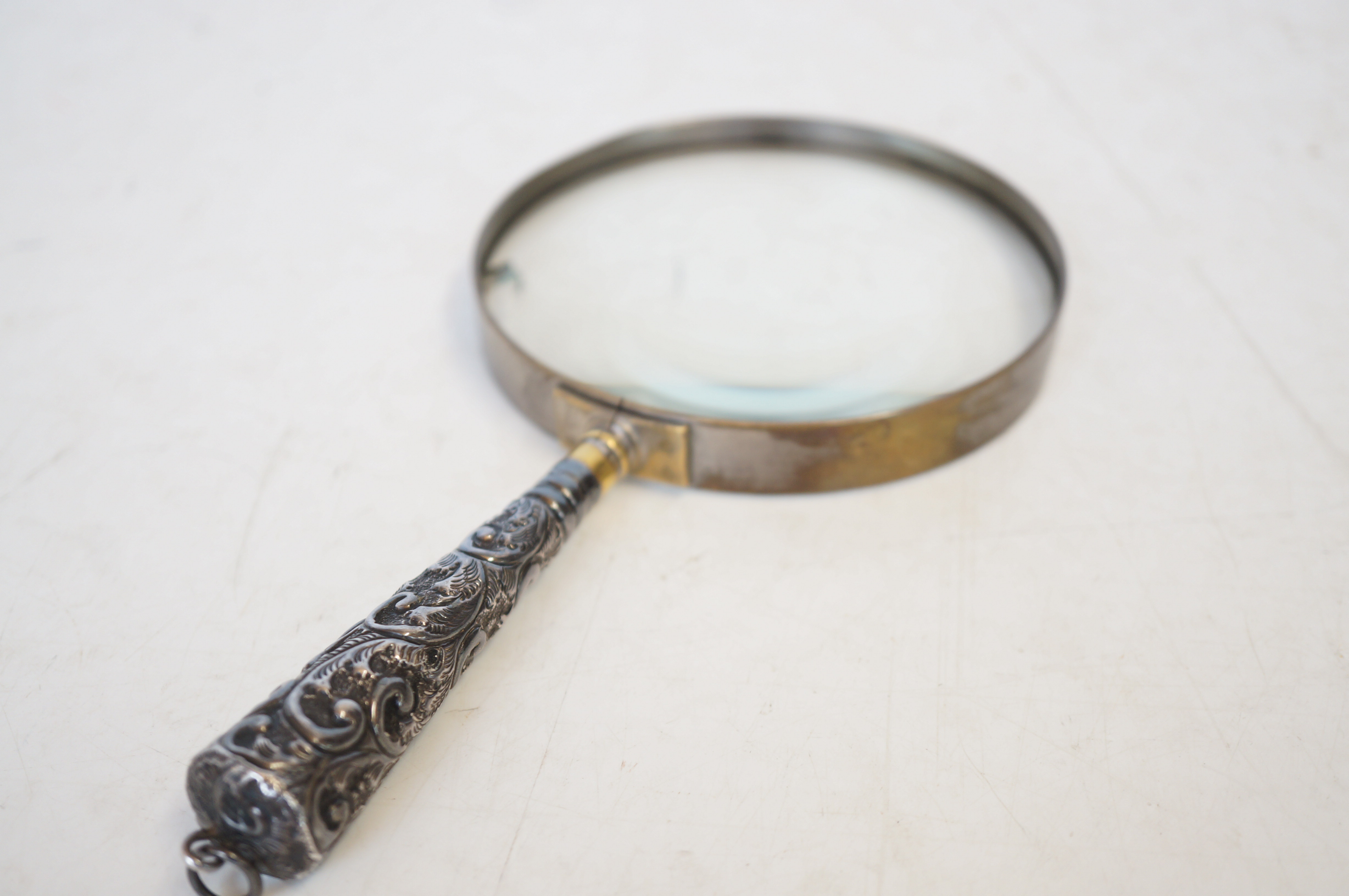 Silver handled magnifying glass