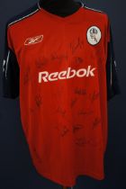 Team signed Bolton Wanderers shirt