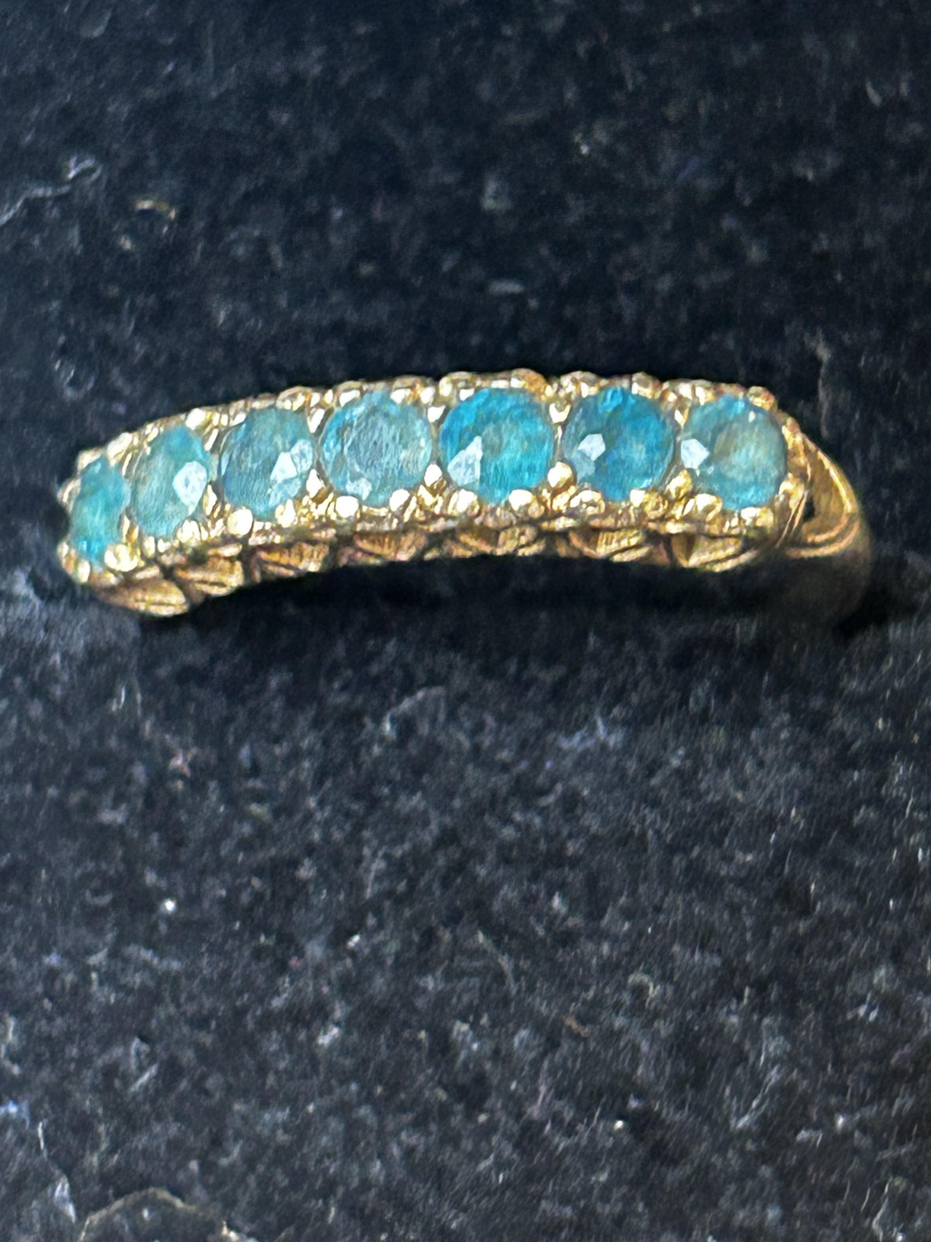 9ct Gold ring tested for 9ct set with 7 gemstones