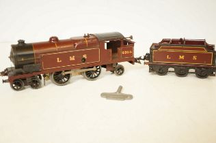 Mecanno clock work train & carriage with boxes & k
