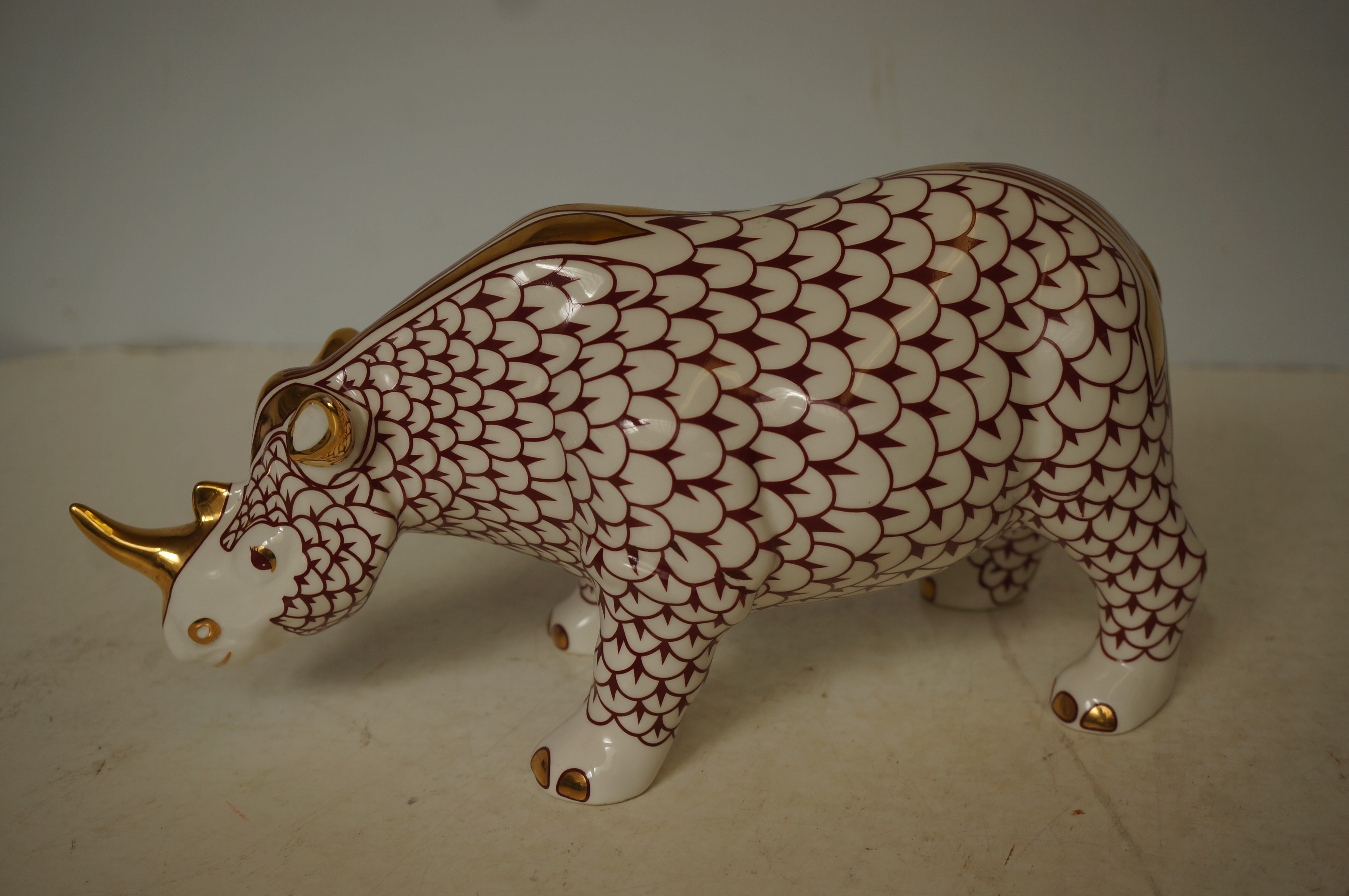 Herend style porcelain rhinoceros minor loss to ho