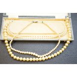 2 Pairs of pearl necklaces