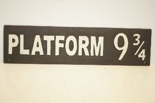 Cast iron platform 9 3/4 sign