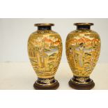 Pair of early satsuma vases on wooden stands Heigh