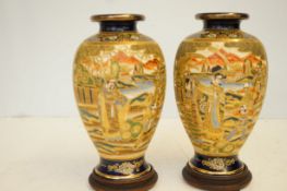 Pair of early satsuma vases on wooden stands Heigh