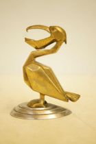 Bronze mascot/sculpture of a pelican, possibly Wal