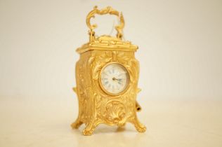 Miniature french gilded carriage clock
