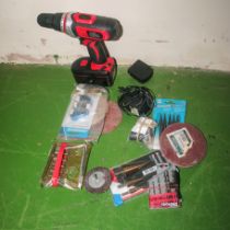 An 18 volt drill and other items