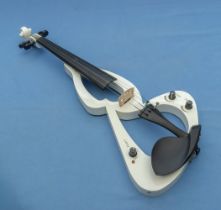 An electric violin with bow and case
