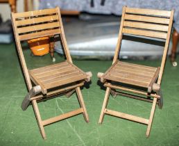 Two folding garden chairs