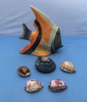 Wooden fish and four shells