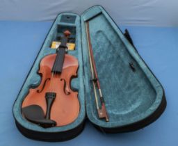 A starter violin and bow in case