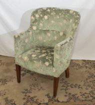 An upholstered Parker Knoll tub chair