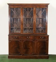 A late 20th century bookcase with 3 glazed door and 3 panel doors 150cm wide x 200cm tall x 42cm