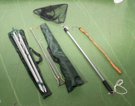 A landing net, hooks and other items