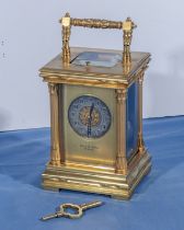 A brass repeater carriage clock with double barrel movement and column front, in perfect working