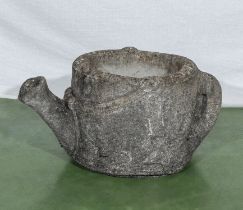 Reconstituted stone garden planter in the form of a watering can